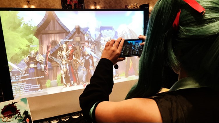 Hatsune Miko playing AdventureQuest 3D